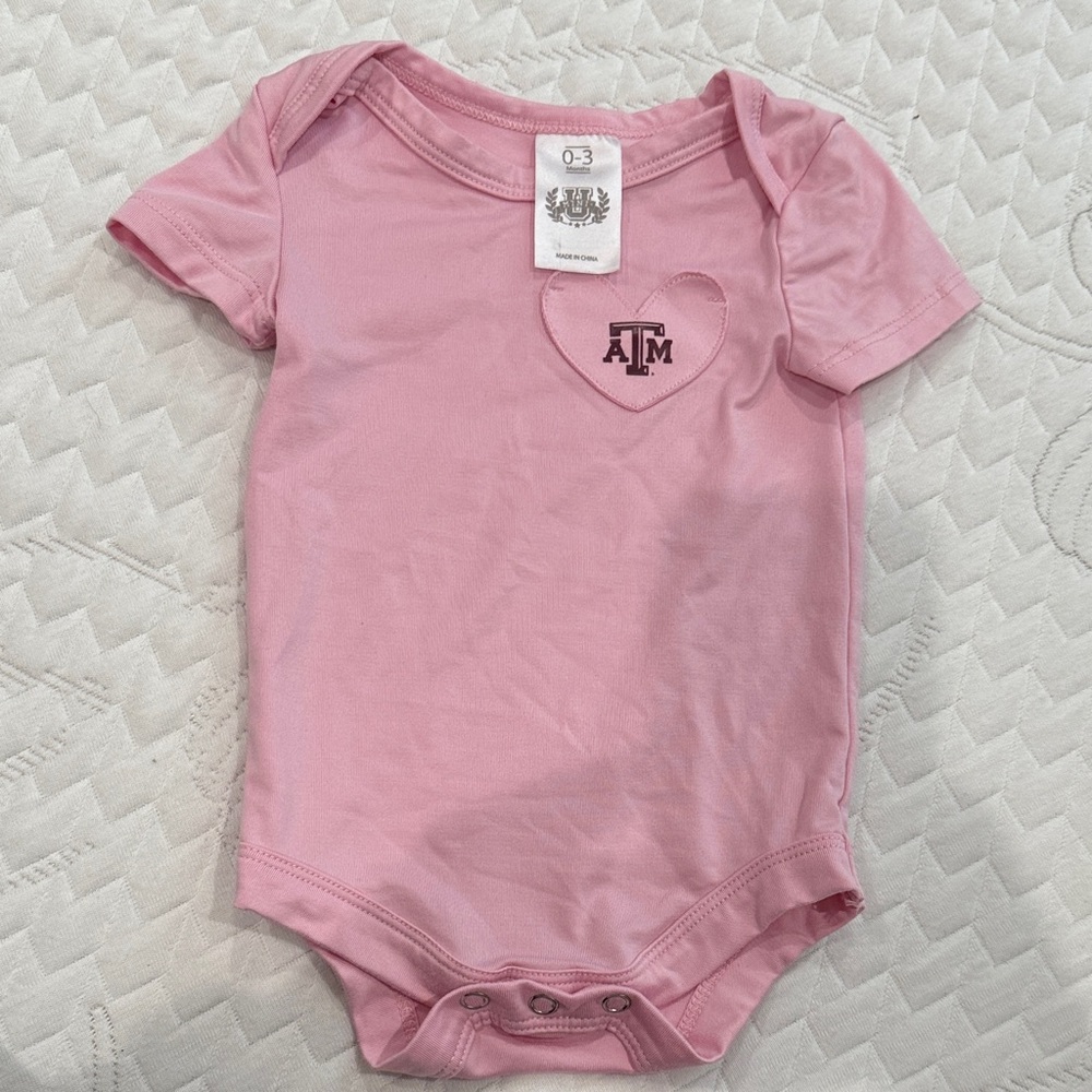 Pink Texas A&M Baby Onesie with Heart Logo